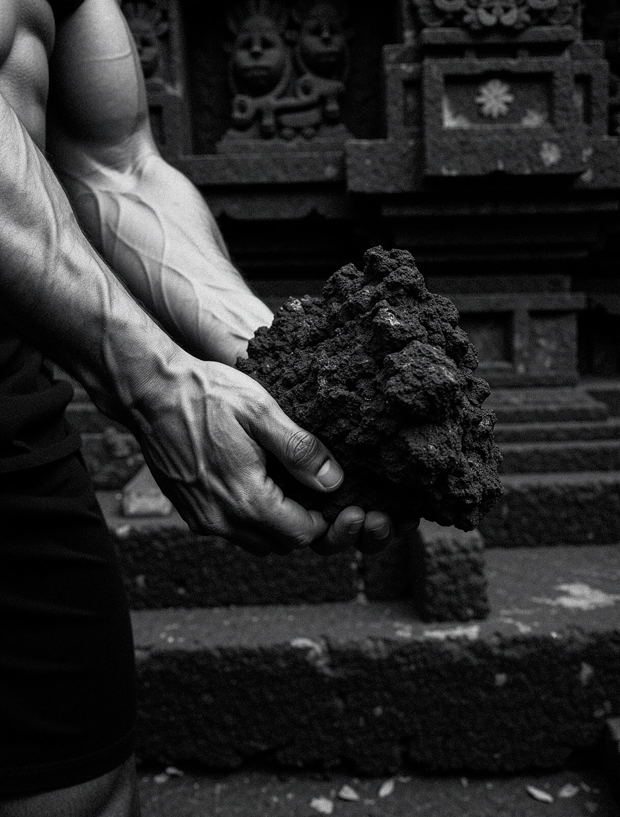 Detail of physical grip on volcanic stone in Bali